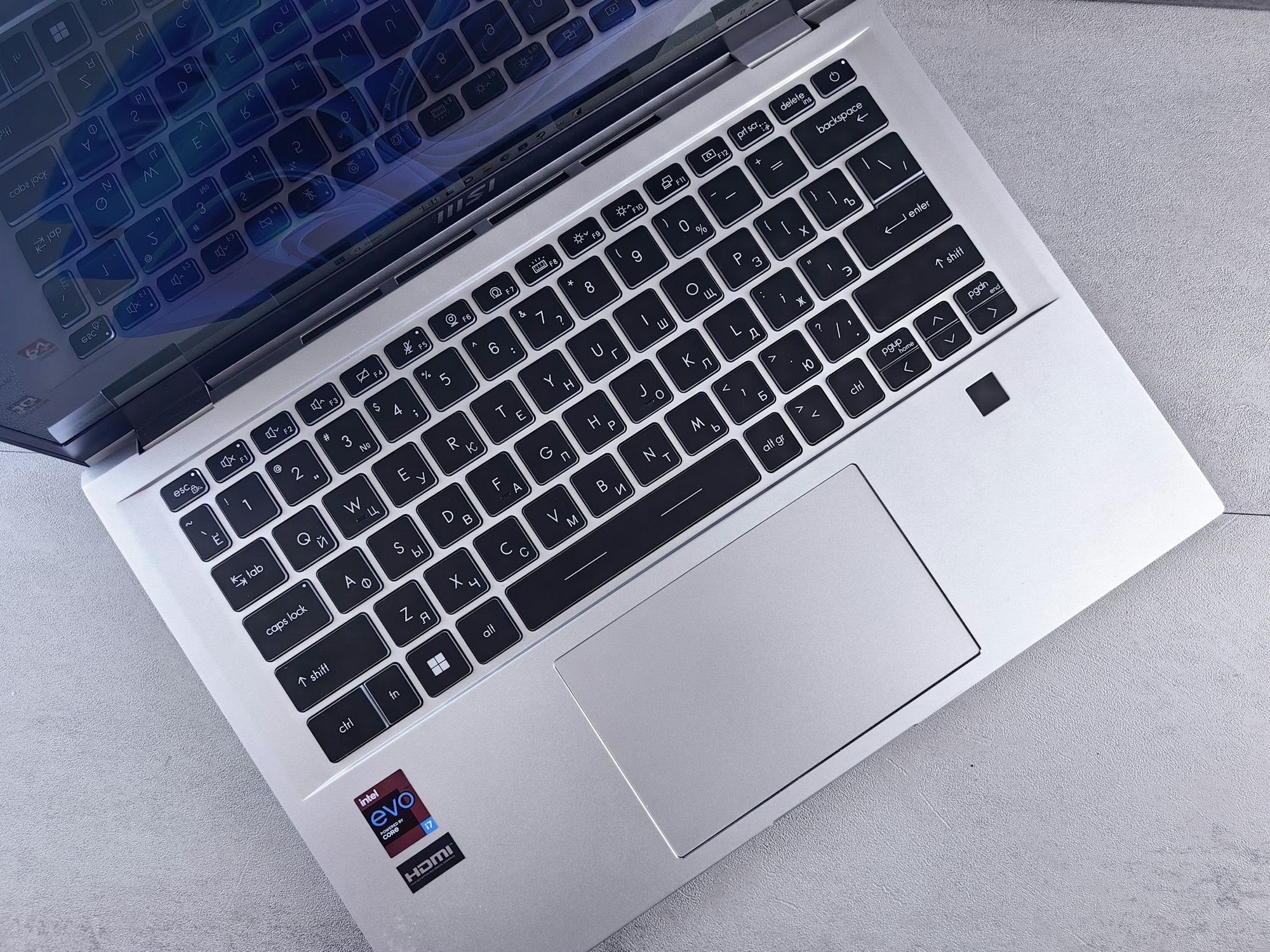 Open laptop computer on a desk ready for work