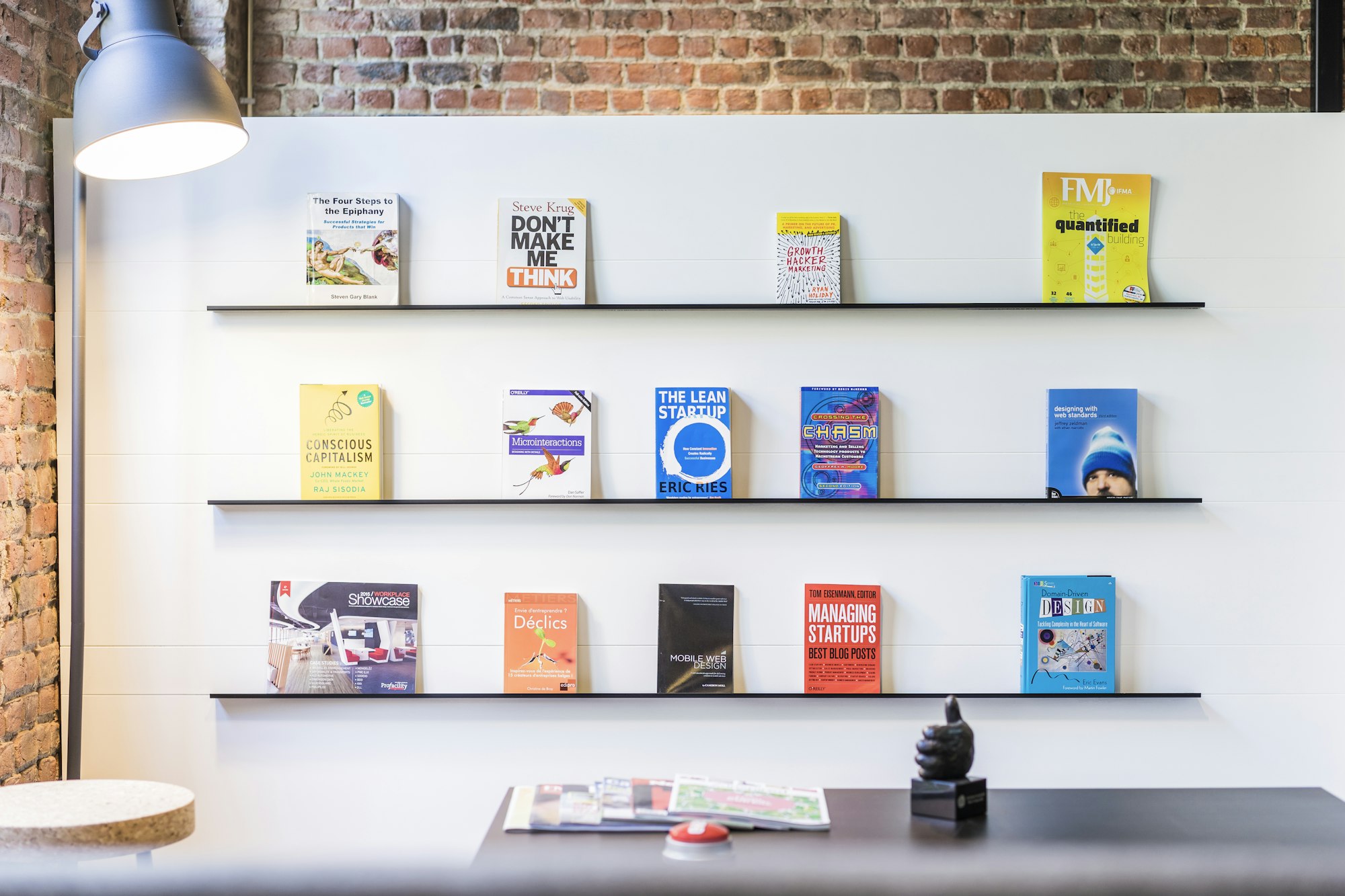 Black wooden shelf in a business setting