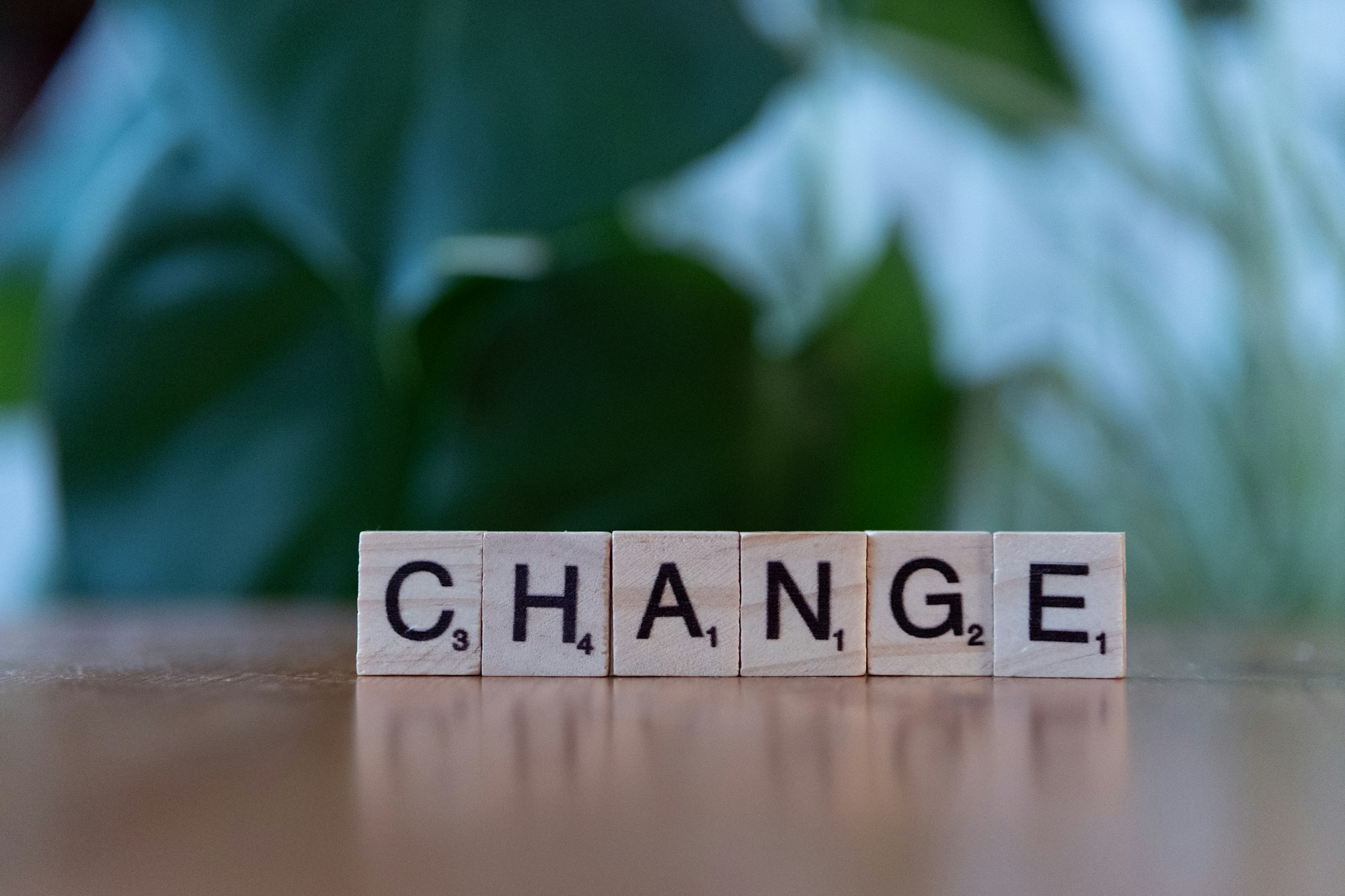 Scrabble blocks spelling change on a table