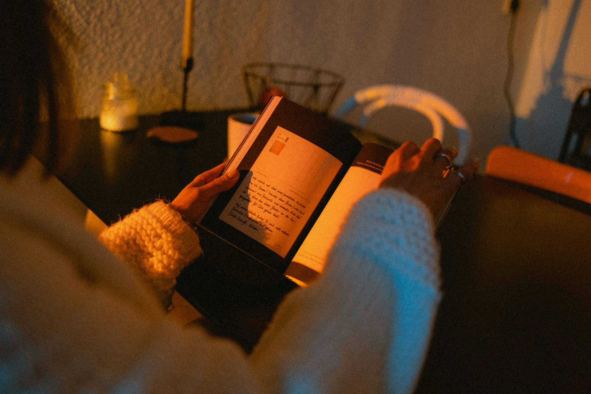 Person holding black tablet computer