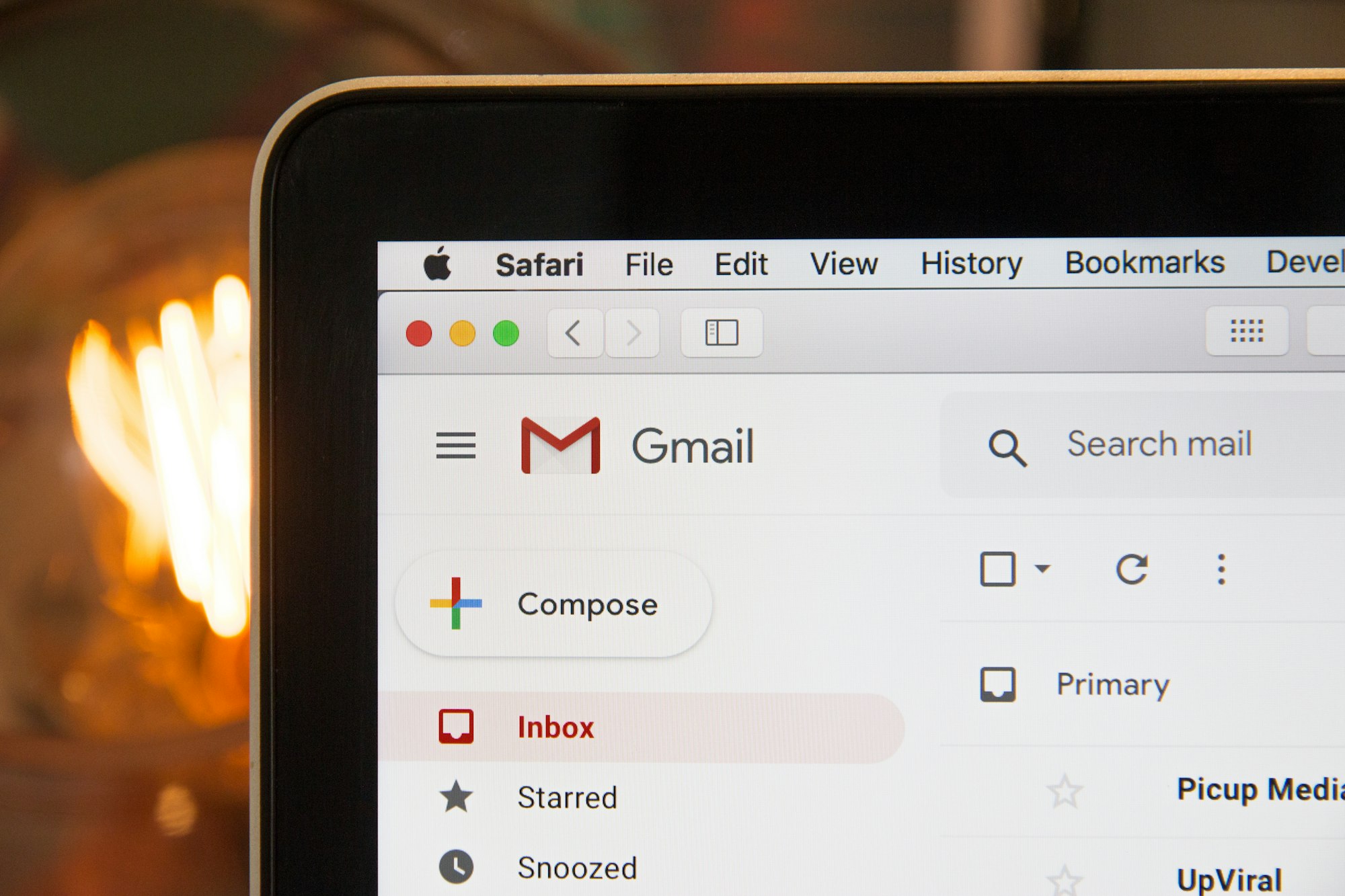 Black laptop computer showing email interface