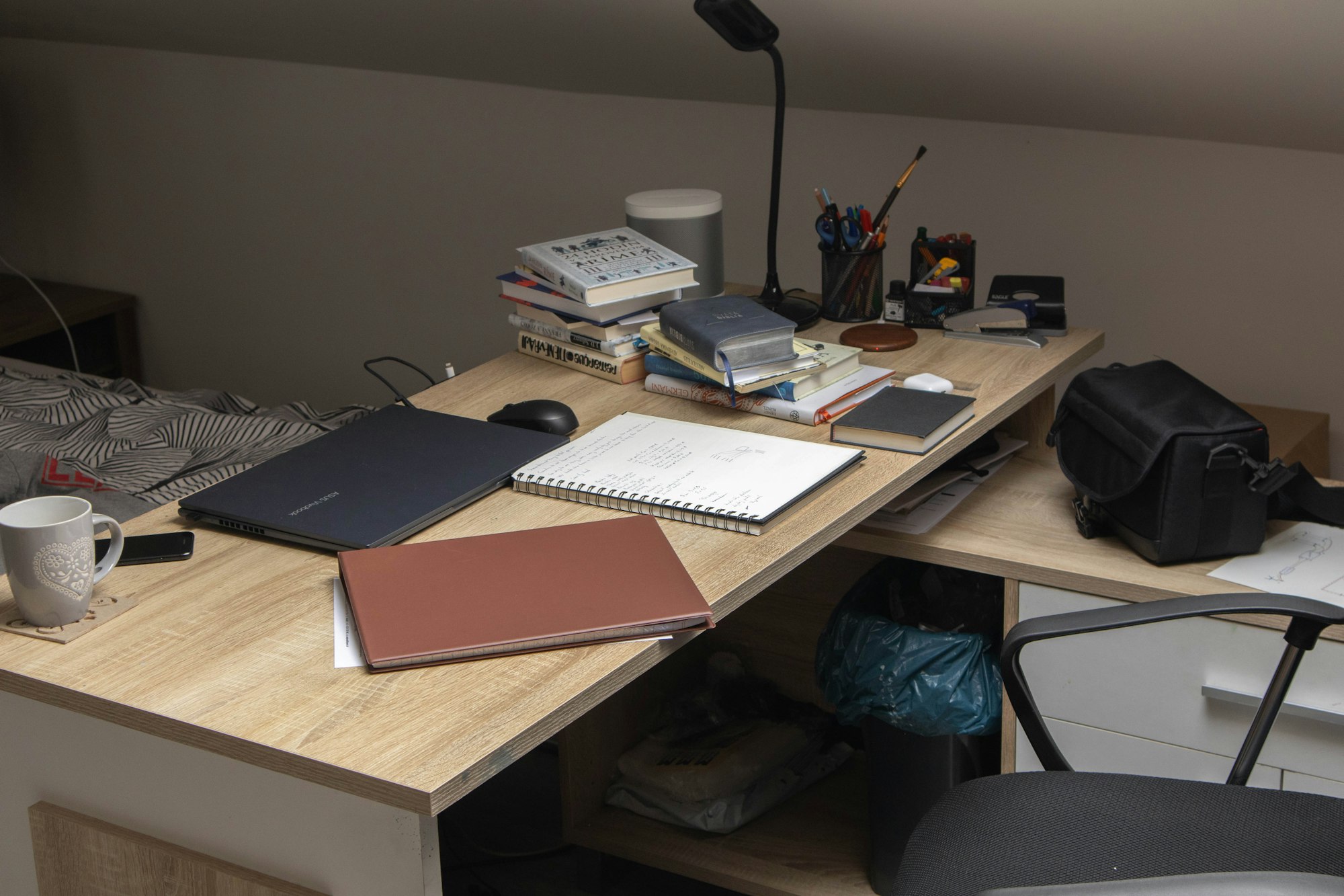 Wooden desk with a laptop computer in a home office