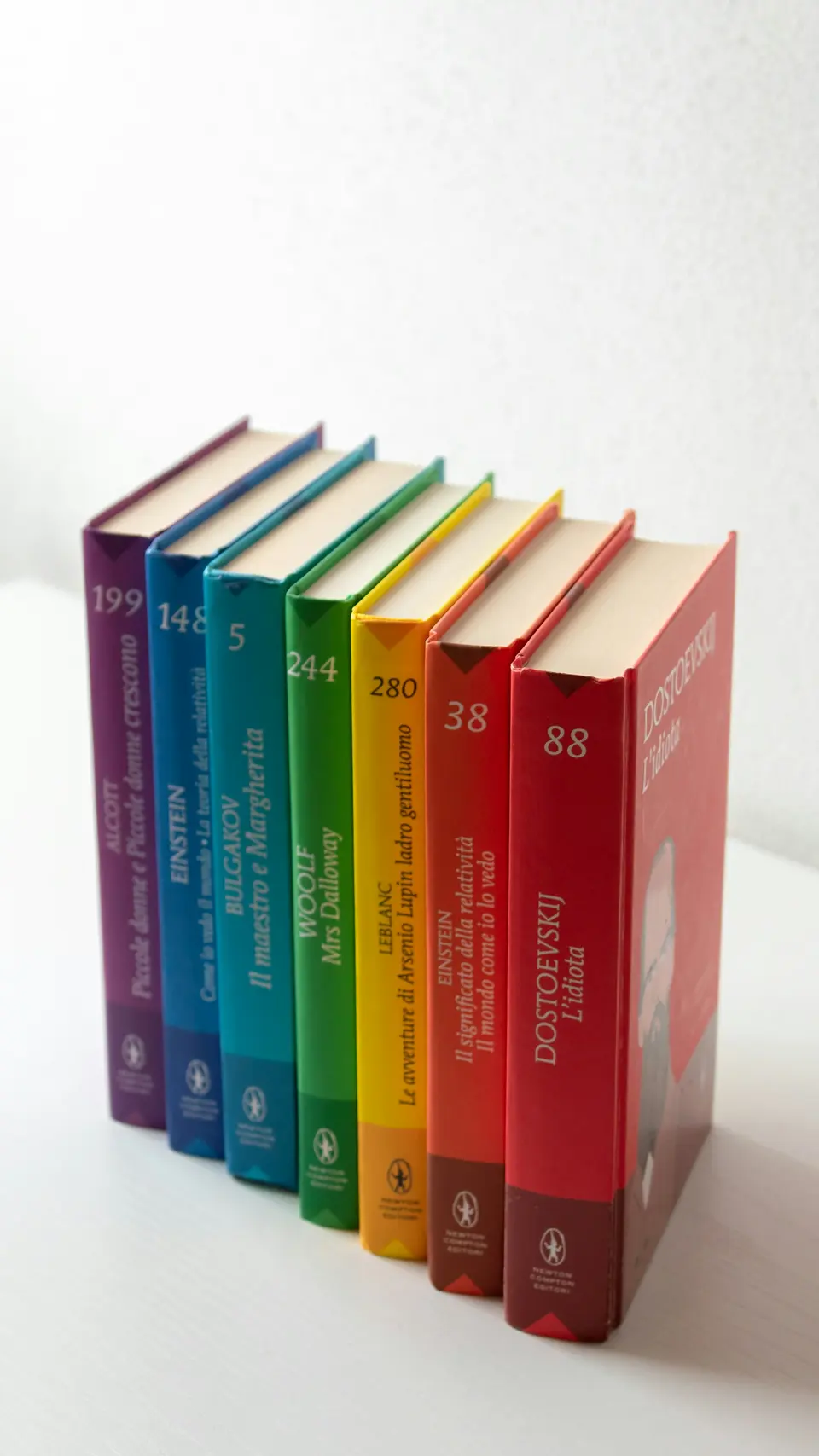 A colorful row of books standing upright