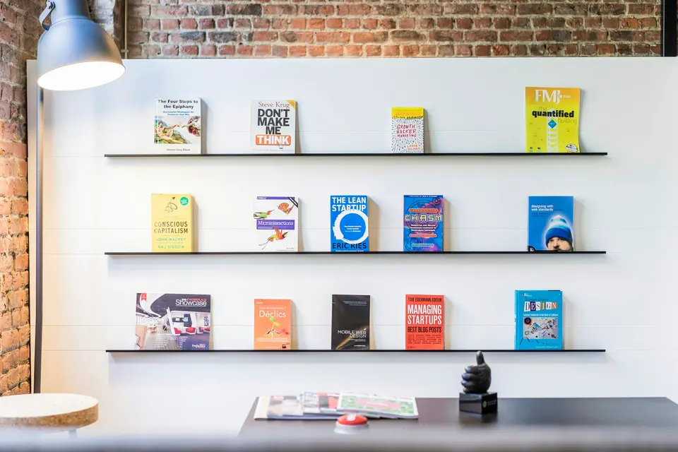 Black wooden shelf in a business setting