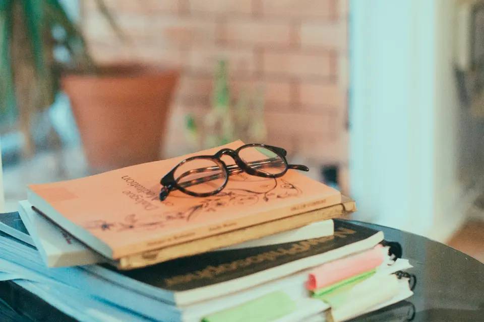 A pile of books on a table