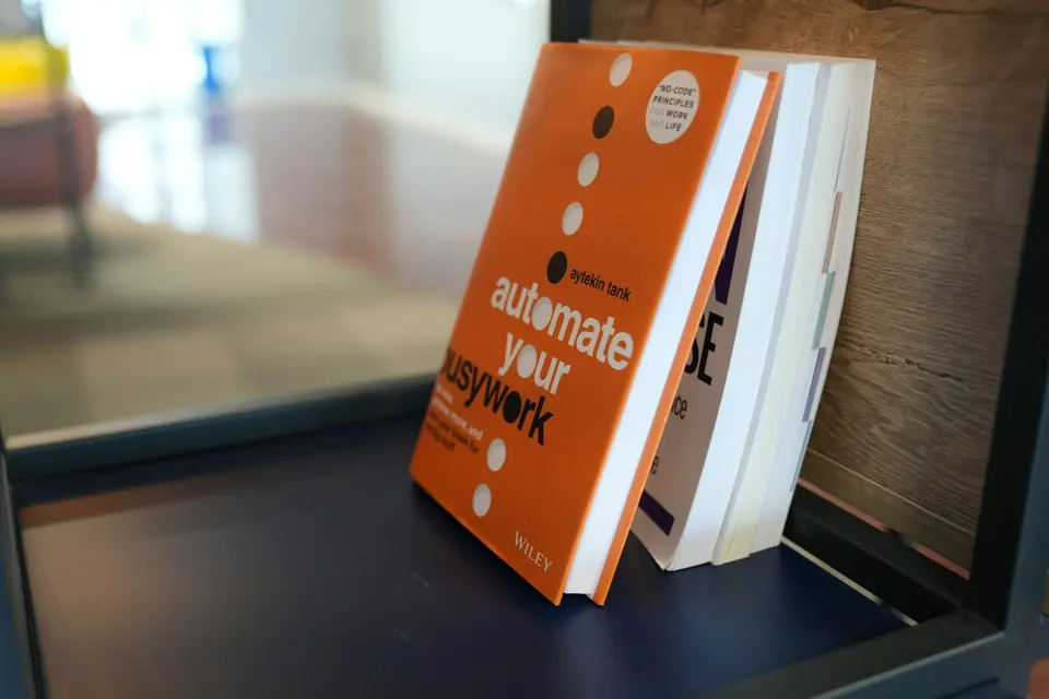 A stack of books sitting on top of a table
