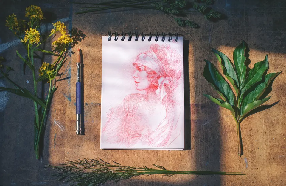 A person sketching in a studio