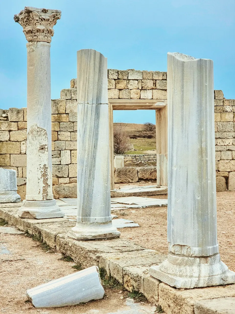 A group of stone pillars in an ancient building