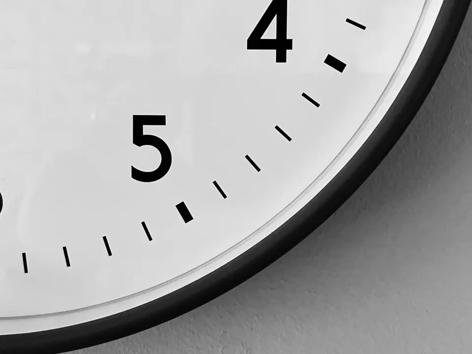 Close-up of the face of a wall clock